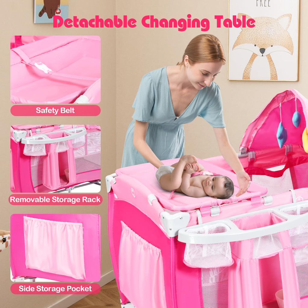 4 in 1 Pack and Play Portable Baby Bassinet Playpen with Diaper Changer Mattress Canopy Storage Rack Toy Bar Music Box Foldable Travel Playard Pink P136665